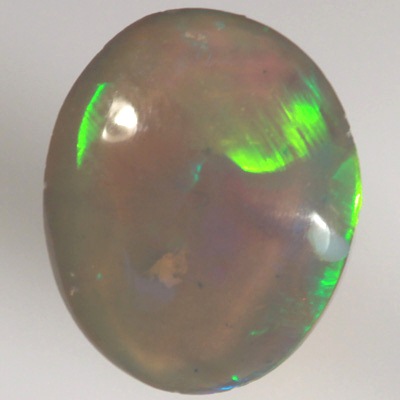 SOLID CRYSTAL OPAL Bright rolling flashes, green and yellow